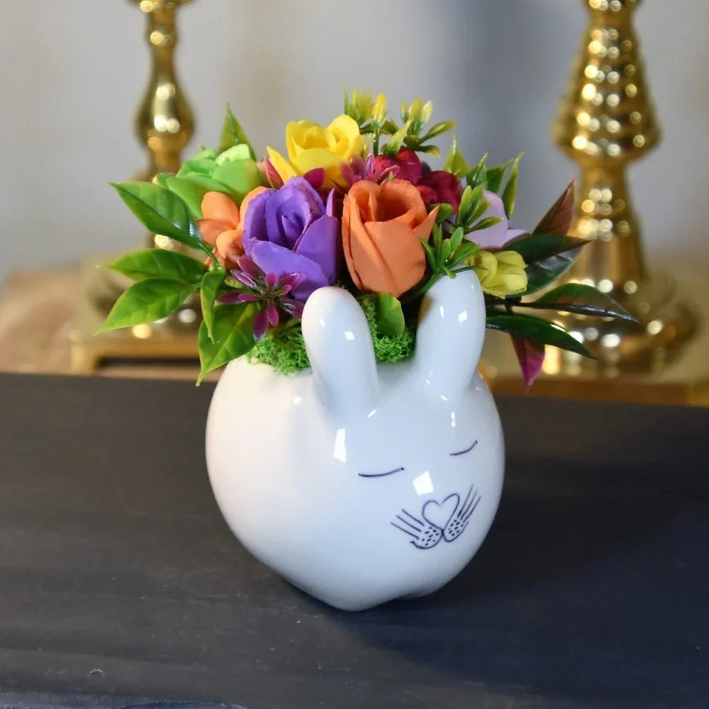 Cute small bunny rabbit planter filled small Sola flowers dyed in bright colors